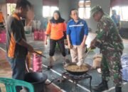 TNI dan Masyarakat Bersihkan Sisa Banjir di Popayato