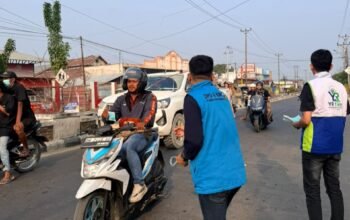 Udara Pohuwato Kurang Kondusif, YR TIM dan KNPI Bagikan 10.000 Masker