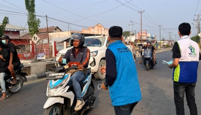 Udara Pohuwato Kurang Kondusif, YR TIM dan KNPI Bagikan 10.000 Masker